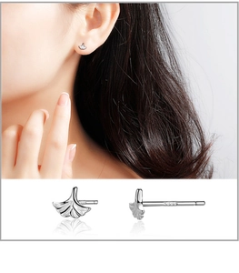 Detailed view of S999 sterling silver ginkgo leaf stud earring with engraved purity stamp