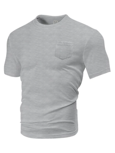 Detail of grey waffle knit fabric texture and chest pocket on men's short sleeve T-shirt
