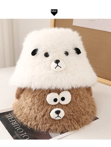 Detail view of plush lamb-shaped bucket hats in cream and brown with cute animal ears