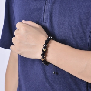 Adjustable black onyx bead bracelet with gold letter A and tiger eye stone for women