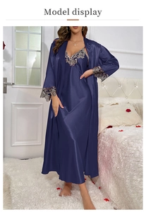 Close-up of intricate lace trim on navy blue satin nightgown and robe sleeve set