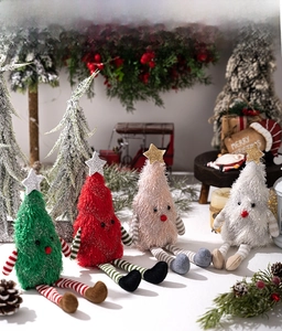 Set of four plush Christmas tree dolls in green, red, pink and white with star toppers