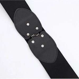 Detail of black elastic belt with heart-shaped buckle and metal screw hardware