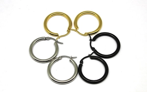 Three pairs of thick 3mm stainless steel hoop earrings in gold, silver, and black finish