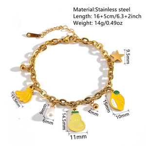 Gold stainless steel fruit charm bracelet featuring lemon, banana and star pendants