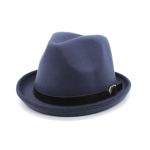 Detail of dark blue wool fedora hat featuring a black leather band and silver metal buckle