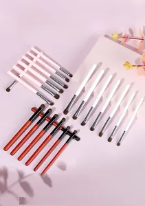 Detailed close-up of 7-piece pony hair eyeshadow brushes set on elegant pink styling