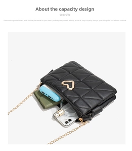 Detail showing internal capacity of quilted crossbody bag with daily essentials inside
