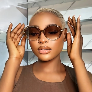 Fashionable oversized round brown gradient sunglasses for women with metal accents