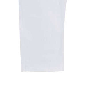 Detail of white linen pants hem showing high-quality stitching and cotton fabric texture