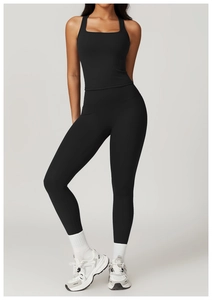 Detailed view of the square neck tank top and high waist leggings fitness set on a model