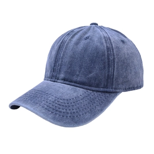 Detailed side view of washed blue vintage baseball cap with reinforced stitching and curved brim