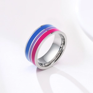 Macro view of polished stainless steel ring with bisexual pride flag stripes.