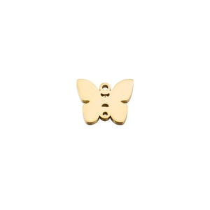 Close-up of golden butterfly pendant charm with polished mirror finish and three-hole design