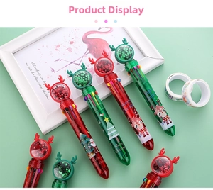 Close-up of Christmas 10-color shuttle pen with reindeer topper and sequins decoration