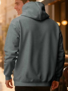 Close-up of dark grey hoodie featuring ribbed cuffs and high-quality knit texture