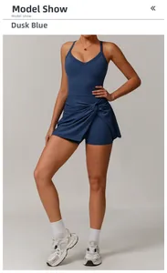 Twilight Blue athletic dress with criss-cross back straps and pleated knot detail skirt