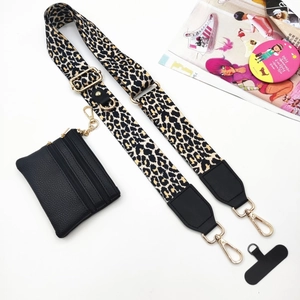 Adjustable leopard print strap with detachable black pouch and gold metal hooks
