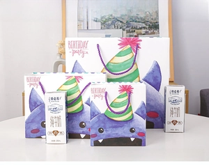 Detailed set of three sizes of cartoon monster gift bags with purple braided handles