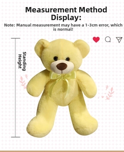 Measurement guide for yellow teddy bear plush showing the full standing height dimension