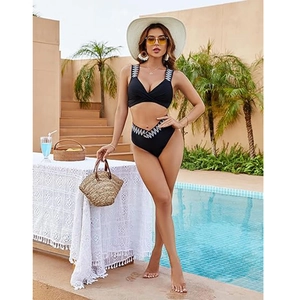 Detail of black bikini set featuring zigzag embroidery on straps and high waistband