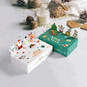 3D Christmas gift boxes with pop-up cartoon characters for festive candy packaging