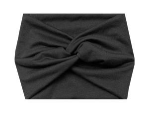 Close-up of black elastic knit yoga headband with a classic twisted knot detail