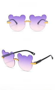 Kids bear-shaped rimless sunglasses featuring purple and pink gradient lenses