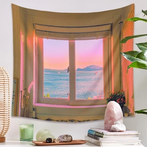 Tapisserie murale bohème montrant une vue sur mer au coucher du soleil par une fenêtre