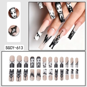 Halloween coffin press-on nails with cartoon castle, bat art and Wednesday goth character
