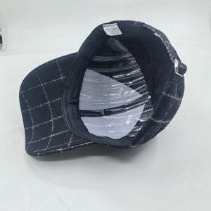 Winter plaid baseball cap with warm ear flaps and adjustable metal buckle closure