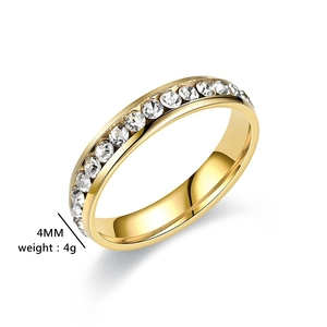 Close-up of 4mm titanium steel ring with micro-pave cubic zirconia in gold finish