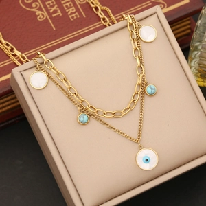 Golden double-layer evil eye necklace with turquoise beads and shell pendants