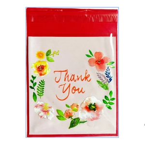 Red self-adhesive cookie bag with floral 'Thank You' card for handmade pastries and sweets
