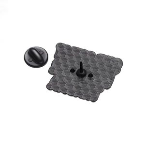 Black alloy brooch back view with honeycomb texture and secure rubber clasp pin backing