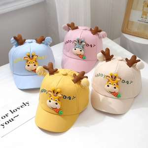 Detail of four colorful soft brim baby baseball caps with 3D giraffe ears and embroidery