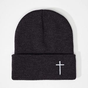 Classic charcoal knit beanie featuring a white embroidered cross on the folded cuff edge