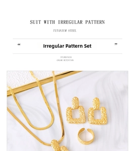Detail of vintage gold-plated titanium steel jewelry set featuring irregular textured pattern