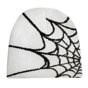 White knitted beanie featuring a black spider web pattern for autumn and winter streetwear