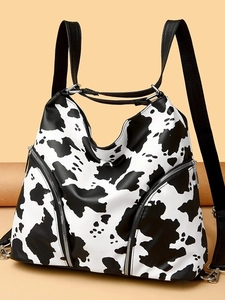 Large leopard cow print leather tote bag for women, stylish travel and commuter backpack