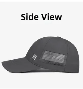 Detail of dark grey quick-dry baseball cap with side mesh vents and metal logo plate