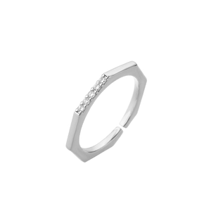 Detailed view of silver hexagonal ring with pavé micro-zirconia and adjustable band