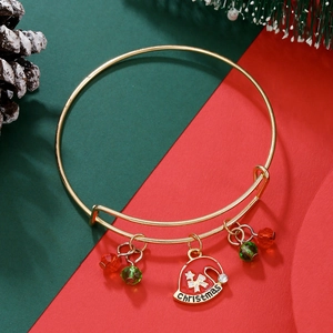 Detailed shot of Christmas adjustable bracelet with red hat charm and festive beads