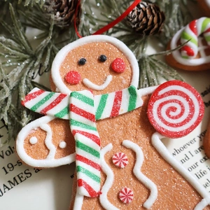 Resin Christmas gingerbread man hanging ornament with glitter coating and scarf