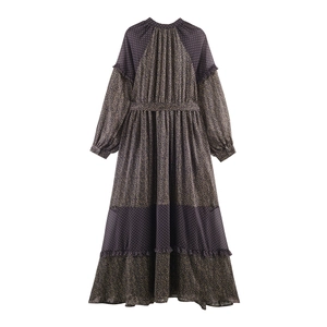Bohemian polkadot dress with long sleeves, waist tie, and pleated ruffle hem in dark blue