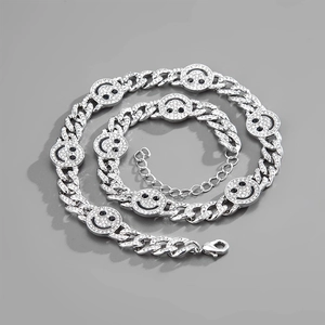 Minimalist silver Cuban chain necklace with sparkling rhinestone smiley face charms