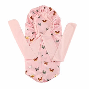 Detail of pink satin bonnet featuring colorful butterfly prints and long ribbon ties