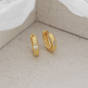 Detailed view of gold S925 silver hoop earrings with marquise-cut zircon and rib texture