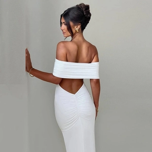 Macro shot of white off-shoulder mini dress featuring backless design and ruched details