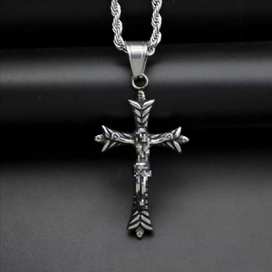 Vintage stainless steel Jesus cross pendant necklace with a durable wheat chain on dark surface